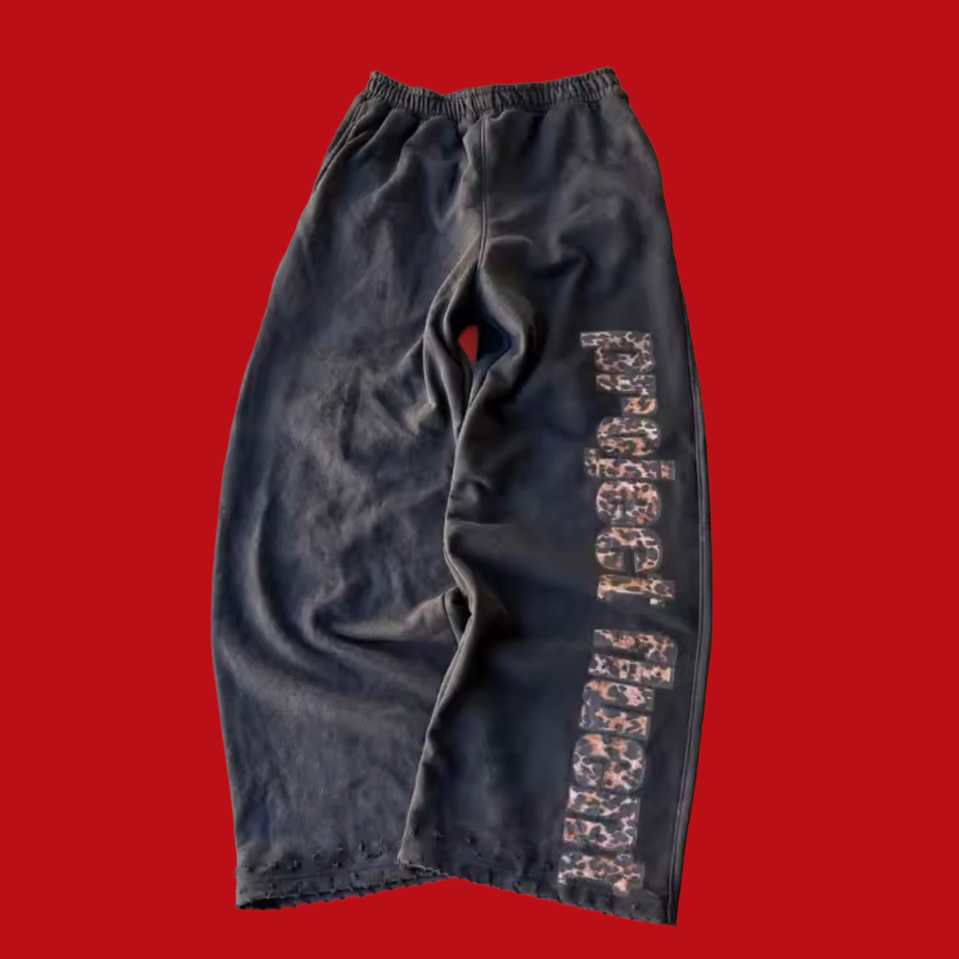 "Project Fluent" leopard print Joggers black